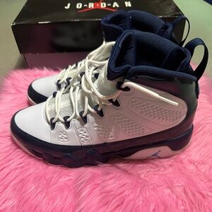 Jordan Retro 9 UNC Sneakers in White and Navy